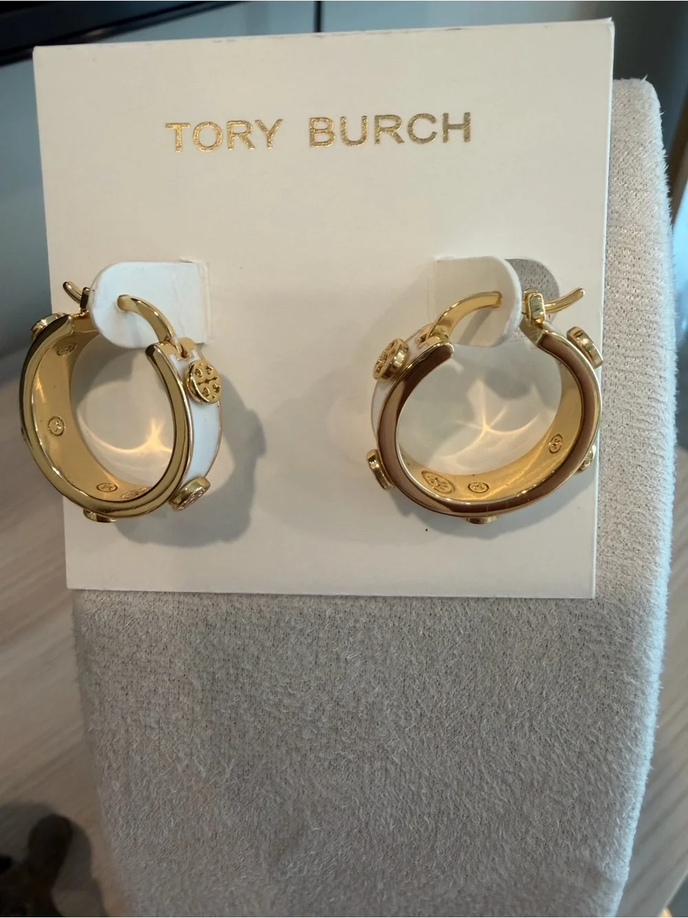 Tory Burch White Enamel and Gold Logo Huggie Earrings